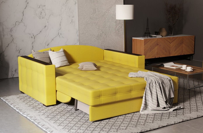 раскладной диван желтого цвета в интерьере