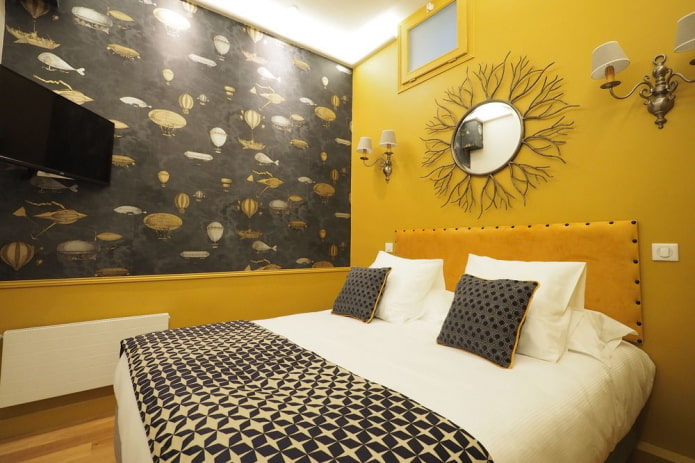 декор и освещение в интерьере спальни в желтых тонах